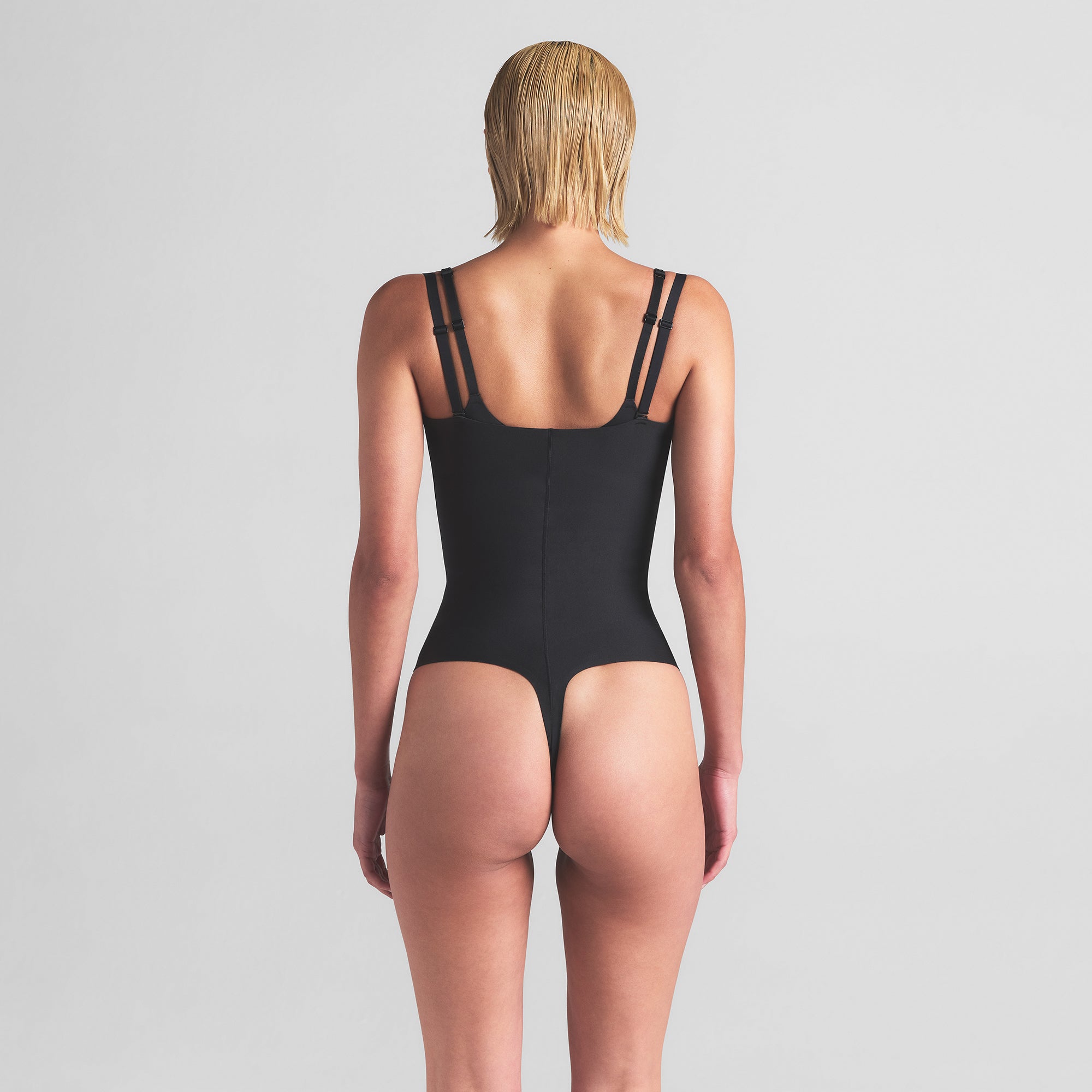 SKIMS BODY CORE SCULPT OPEN BUST THONG BODYSUIT | ONYX