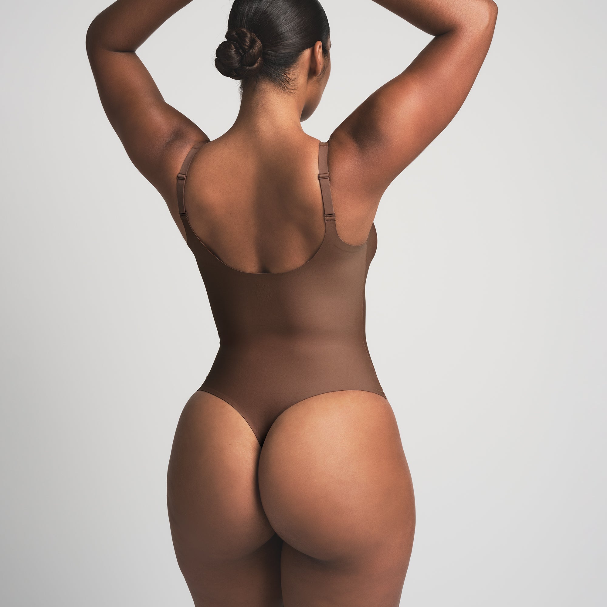 SKIMS BODY UNLINED PLUNGE THONG BODYSUIT | JASPER