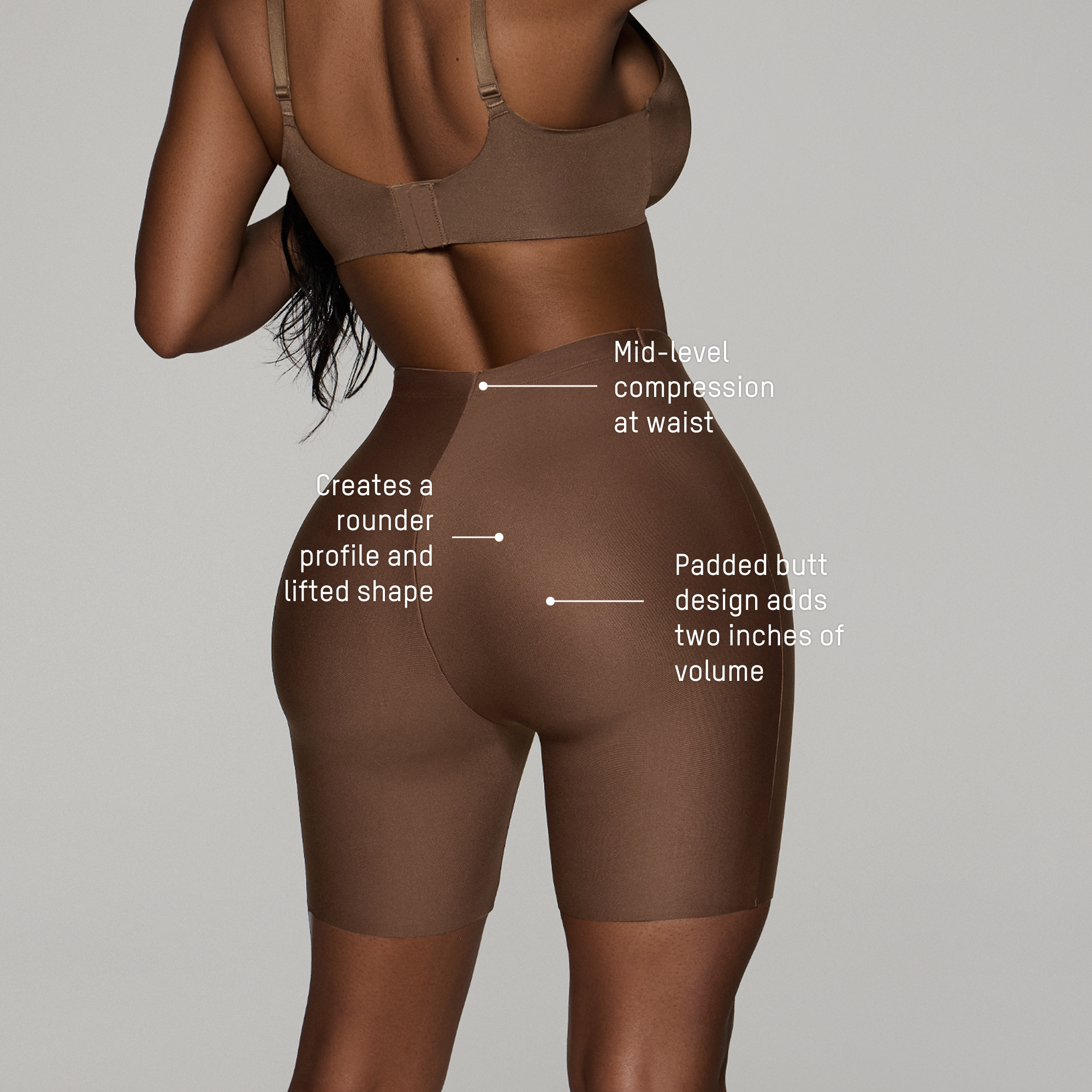SKIMS BODY BUTT ENHANCING OPEN BUST PADDED BODYSUIT | ONYX
