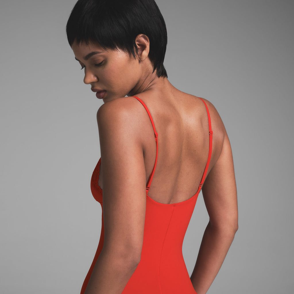 FITS EVERYBODY LACE TRIANGLE ONESIE | CAYENNE